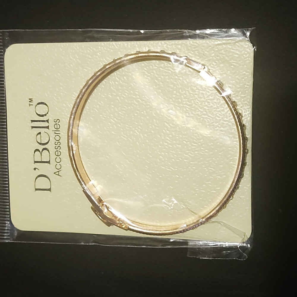 D Bello gold tone hinge bracelet with diamonds